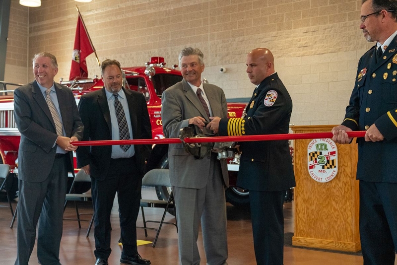 County officials and Prince Frederick Volunteer Fire Department (PFVFD) leadership cut a “ribbon” to celebrate the opening of the new PFVFD building. Pictured from left are Commissioner Mike Hart, Commissioner Kelly McConkey, Commissioner President Earl “Buddy” Hance, Prince Frederick Volunteer Fire Department Fire Chief Joseph Della-Camera and Prince Frederick Volunteer Fire Department President Patrick Hassler.