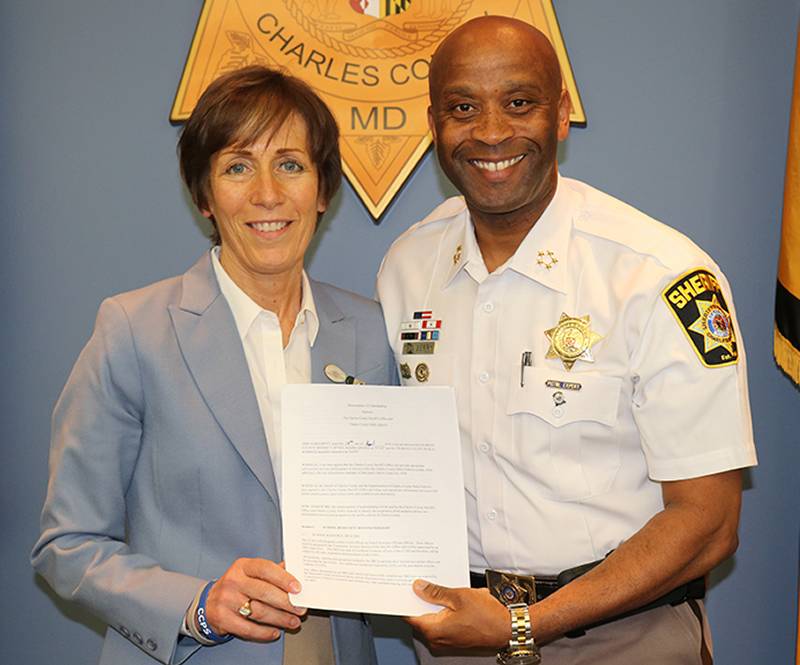  Superintendent Kimberly Hill, left, and Sheriff Troy Berry renew their commitment to the long-standing partnership between Charles County Public Schools and the Charles County Sheriff’s Office signing a memorandum of understanding on April 17 that outlines expectations for special law enforcement services and programs to schools.