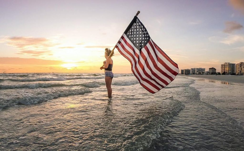 flag-beach-girl-1024x633.jpg