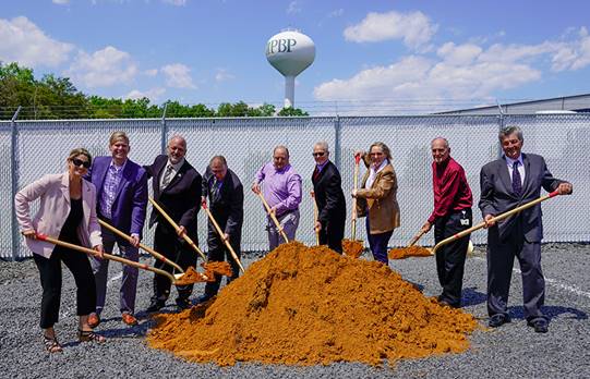 BHE GT&S: Pictured, from left: Julie Oberg, director of economic development for Calvert County; Danny Woods, vice president of operations for BHE GT&S Cove Point LNG; Commissioner Chris Gadway; Commissioner Mike Hart; Frank Brayton, director of LNG operations for BHE GT&S Cove Point LNG; Commissioner Vice President Steven Weems; Chris McNelis, realtor/listing agent, Berkshire Hathaway HomeServices PenFed Realty; David Melson, Supervisor Cove Point LNG Maintenance, BHE GT&S Cove Point; and Commissioner President Earl Buddy Hance.