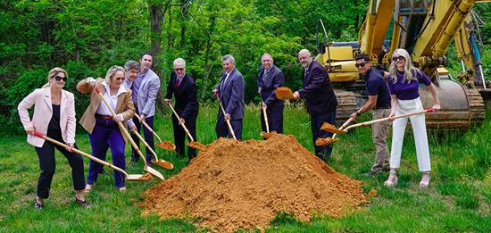 2J Flex Space: Pictured, from left: Julie Oberg, director of economic development for Calvert County; Chris McNelis, realtor/listing agent, Berkshire Hathaway HomeServices PenFed Realty; Bruce Alderman, Maryland Department of Commerce; Tony Olekson, RA Barrett & Associates; Commissioner Vice President Steven Weems; Commissioner President Earl Buddy Hance; Commissioner Mike Hart; Commissioner Chris Gadway; Jeremy Schultz, 2J Enterprises, LLC; and Lauren Simpson, 2J Enterprises, LLC.