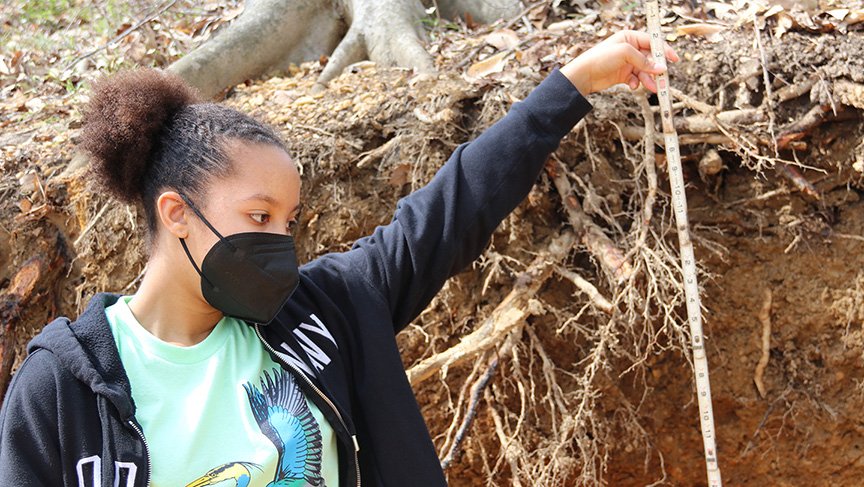 Westlake High School freshman Julia Pender measures soil during an activity at Gilbert Run Park. The Charles County Envirothon tests students’ knowledge of environmental issues.