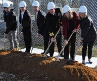 Navy officials, including Naval Surface Warfare Center Dahlgren Division (NSWCDD) leadership, break ground for the command’s new Cyber Warfare Engineering Laboratory, Dec. 12. The facility will bring together the building blocks of existing capabilities into one place to provide a robust and flexible software and hardware testing capability for Department of Defense and Navy weapon systems, cyber and network platforms in addition to industrial control systems supporting DoD infrastructure. From left to right: Christopher Keener, NSWCDD cyber engineer; Darren Barnes, NSWCDD acting technical director; Scott St. Pierre, Enterprise Information Technology officer, Naval Sea Systems Command; Capt. Casey Plew, NSWCDD commanding officer; Shellie Clift, NSWCDD Strategic and Computing Systems Department head; Nancy Fitzgerald, principal, CFM Engineering. (Photo by U.S. Navy/Released)