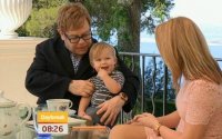 Elton-John-with-son-Zachary-during-an-interview-with-ITVs-Daybreak-600x373.jpg