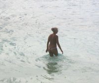 Topless blond at beach.jpg