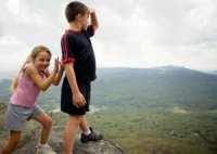 girl-pretends-to-push-brother-off-a-cliff[1].jpg