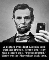 Lincoln with his iphone.jpg