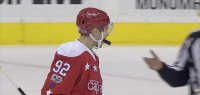 evgeny-kuznetsov-puck-in-mouth.jpg