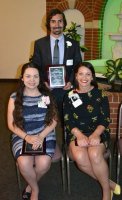 Standing is Nicholas Andrews, La Plata High School. Seated, from left, are Hannah Matthews, Benjamin Stoddert Middle School, and Monica Halloran, Mt. Hope/Nanjemoy Elementary School.