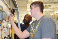 La Plata High School junior Cole Clements, left, demonstrates how to manage an HVAC unit to his program instructor, John Young, at the Robert D. Stethem Educational Center. Clements is a first year HVAC program student and said he chose to pursue the HVAC program because he will graduate with certifications completed to transition right into the workforce doing something he enjoys. 