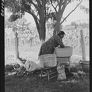 Washing clothes in Ridge, MD, July 1941