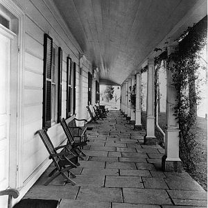 Flagstone portico, at extreme left, door to dining room