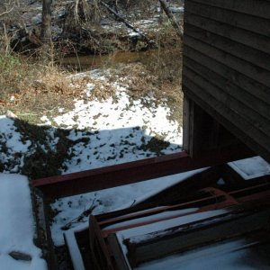 The stream flows just behind the mill