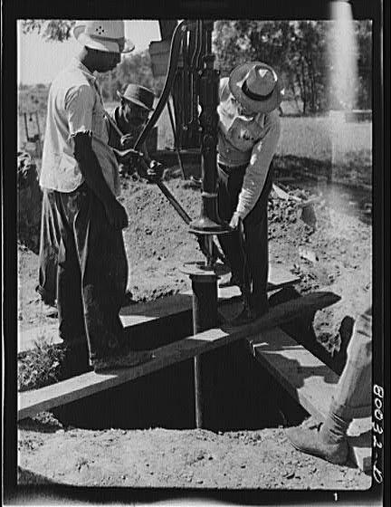 Installing New Water Pump, July 1941