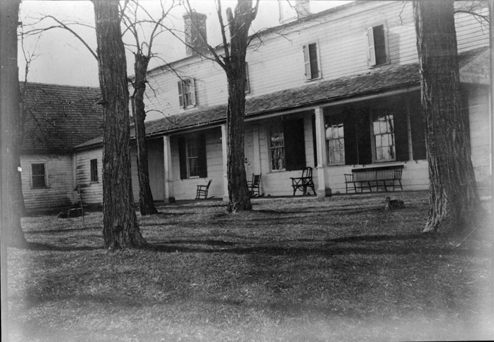 North end (left) and north side of west wing (library) c. 1910