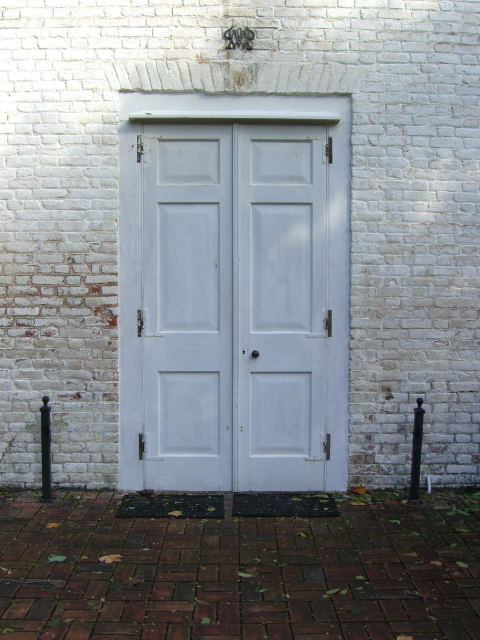 The simple front door of the church